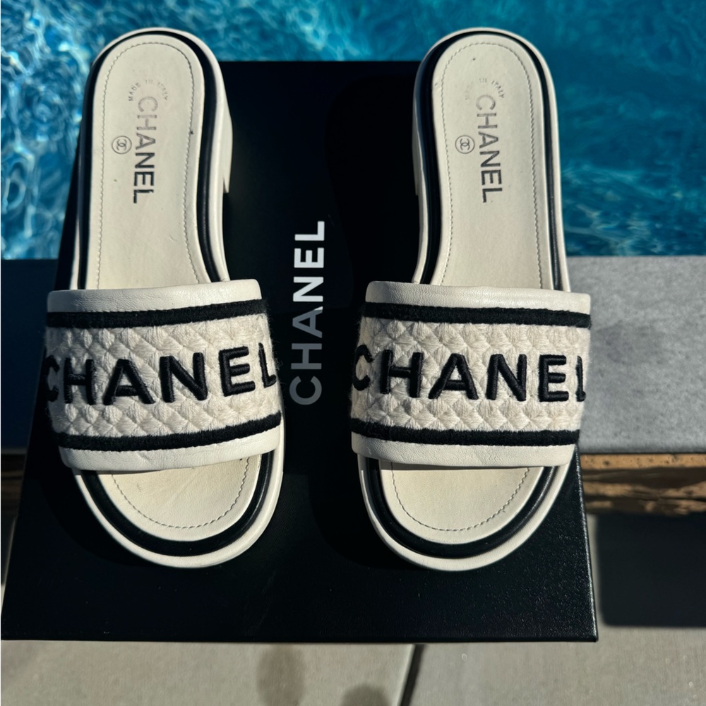 CHANEL Ivory and Black Mules